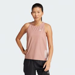 Koszulka bez rękawów Own The Run. Czerwone koszulki sportowe damskie Adidas, xs, bez wzorów, z materiału, bez kołnierzyka, bez ramiączek, do biegania. Za 159.00 zł.