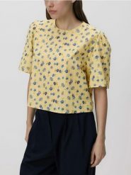 Bawełniana bluzka w kwiaty - wielobarwny. Bluzki damskie Reserved, l, bez wzorów, z bawełny, bez kołnierzyka, bez ramiączek. Za 99.99 zł.