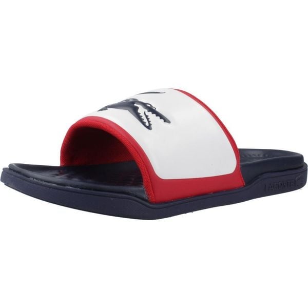 Klapki Lacoste Model Serve Slide Dual Kolor Niebieski. Niebieskie klapki męskie Lacoste, z syntetyku. Za 301.20 zł.