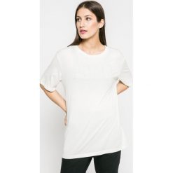 Puma - Top Fusion. Szare topy damskie Puma, z krótkim rękawem. W wyprzedaży za 59.90 zł.