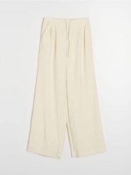 Spodnie wide leg z domieszką wiskozy - kremowy. Białe spodnie materiałowe damskie Sinsay, l, bez wzorów, z wiskozy. Za 49.99 zł.