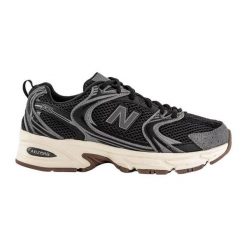 Obuwie - Rekreacja - Damskie - New Balance 530 - Prosty design - Czarny. Czarne obuwie sportowe damskie New Balance, bez wzorów, z materiału, tenisowe. Za 557.00 zł.