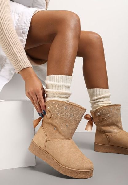 Beżowe Śniegowce Susitna. Brązowe śniegowce i trapery damskie Renee, z futra, przed kolano. Za 69.99 zł.