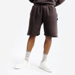 Spodenki Elementals. Brązowe szorty damskie Decathlon, uniwersalny, bez wzorów, z bawełny. Za 99.99 zł.