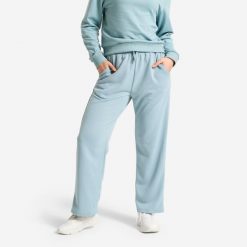 Spodnie dresowe damskie Domyos. Niebieskie spodnie dresowe damskie DOMYOS, l, bez wzorów, z dresówki, na fitness i siłownię. Za 69.99 zł.
