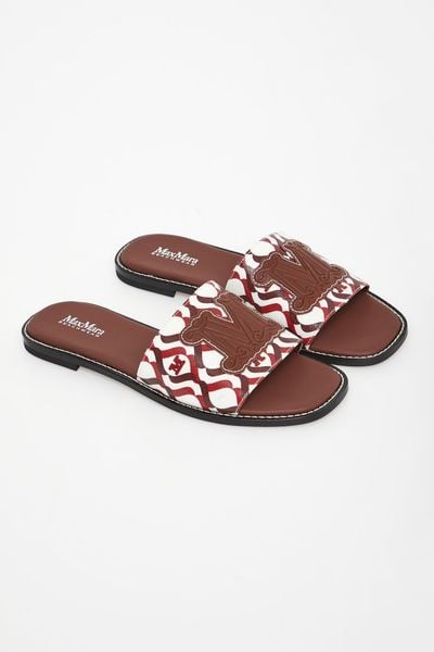 Klapki damskie skórzane Dovere MAX MARA BEACHWEAR. Klapki damskie Max Mara Beachwear, bez wzorów, bez obcasa. Za 979.00 zł.