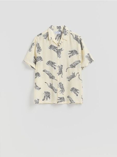 Wzorzysta koszula comfort fit - złamana biel. Koszule męskie Reserved, l, bez wzorów, z tkaniny, bez kołnierzyka, bez ramiączek. Za 129.99 zł.