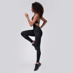 Kombinezon fitness damski Nebbia Intense Golden Czarny. Czarne legginsy damskie Nebbia, bez wzorów, na fitness i siłownię. Za 282.35 zł.