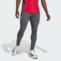 Spodnie treningowe Liverpool FC Tiro 25 Competition. Czarne spodnie sportowe męskie Adidas, bez wzorów, do piłki nożnej. Za 279.00 zł.