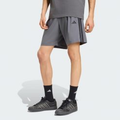Szorty z tkaniny Essentials 3-Stripes Chelsea Lite. Czarne szorty męskie Adidas, s, bez wzorów, z materiału, klasyczne. Za 119.00 zł.