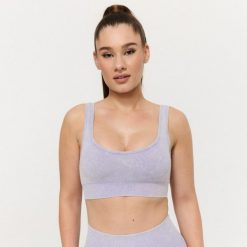 Biustonosz GymBeam Lift. Fioletowe biustonosze GYMBEAM, bez wzorów, z materiału. Za 83.99 zł.