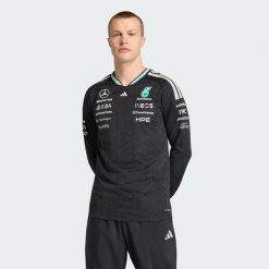Koszulka Z Długim Rękawem Mercedes - Amg Petronas Formula 1 Team Driver Jersey. Czarne bluzki z długim rękawem męskie Adidas, bez wzorów, z jersey, bez kołnierzyka. Za 569.00 zł.
