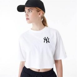 Koszulka sportowa damska New Era Neyyan. Białe koszulki sportowe damskie New Era, s, bez wzorów, z bawełny, bez kołnierzyka, bez ramiączek. Za 275.00 zł.