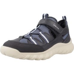 Sandały GEOX J SIMBYOS BOY Niebieski. Niebieskie sandały męskie Geox, z materiału, bez zapięcia. Za 163.99 zł.