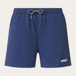 Kąpielówki pływackie męskie Oakley BEACH VOLLEY 16 FOA404310-6GA. Niebieskie kąpielówki męskie Oakley, m, bez wzorów, z materiału, do siatkówki. Za 155.66 zł.