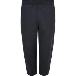 Spodnie Do Joggingu Dla Chłopca. Niebieskie spodnie materiałowe dla chłopców Urban Classics, bez wzorów. Za 121.99 zł.