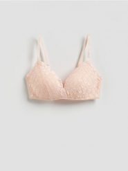 Modulowany biustonosz z koronką - kremowy. Białe biustonosze Reserved, bez wzorów, z dzianiny. Za 69.99 zł.