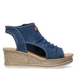 Sandały Rieker. Niebieskie klapki damskie Rieker, bez wzorów, bez obcasa, na koturnie, bez zapięcia. Za 329.99 zł.