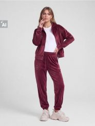 Welurowe spodnie ze ściągaczami - czerwony. Czerwone spodnie materiałowe damskie Sinsay, l, bez wzorów, z weluru. Za 39.99 zł.