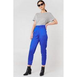 Rut&Circle Błyszczące spodnie Ginny - Blue. Niebieskie spodnie materiałowe damskie Rut&Circle, z haftami, z poliesteru. Za 202.95 zł.
