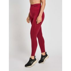 Damskie wysokie legginsy Hummel TIF. Czerwone legginsy damskie Hummel, bez wzorów, z poliamidu, z podwyższonym stanem, na fitness i siłownię. Za 139.00 zł.
