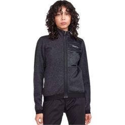 Damska bluza dresowa Craft ADV Gravel. Czarne kurtki damskie Craft, bez wzorów, z dresówki, bez kaptura, rowerowe. Za 664.25 zł.