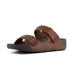 Skórzane sandały FitFlop Gogh. Czarne klapki damskie FIT FLOP, bez wzorów, ze skóry, bez obcasa, bez zapięcia. Za 606.50 zł.