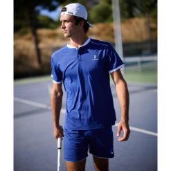 Koszulka polo męska Pro Flex. Niebieskie koszulki polo męskie NORDICDOTS, l, bez wzorów, sportowe, bez ramiączek. W wyprzedaży za 252.00 zł.