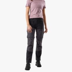 Spodnie Wędrówki damska Swedemount Lofoten Stretch Zip-Off Pants wodoodporna. Czarne spodnie sportowe damskie SWEDEMOUNT, bez wzorów, z tkaniny, trekkingowe. Za 449.99 zł.