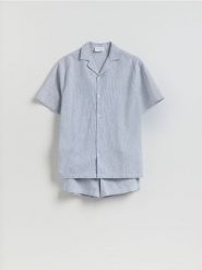 Dwuczęściowa piżama z lnem - jasnoniebieski. Niebieskie piżamy męskie Reserved, l, bez wzorów, z bawełny, bez ramiączek. Za 149.99 zł.