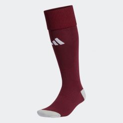 Getry piłkarskie Adidas Milano 23. Brązowe legginsy sportowe męskie Adidas, bez wzorów, do piłki nożnej. Za 30.99 zł.