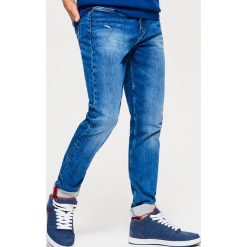 Jeansy SLIM - Granatowy. Niebieskie jeansy męskie Cropp. Za 139.99 zł.