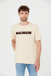 BALMAIN Beżowy t-shirt Retro Balmain Flock. Brązowe t-shirty męskie Balmain, m, bez wzorów, retro, bez kołnierzyka. W wyprzedaży za 1,299.99 zł.