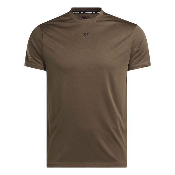 Koszulka Reebok Id Train Tech Tee. Brązowe koszulki sportowe męskie Reebok, bez wzorów, bez kołnierzyka, bez ramiączek. Za 65.99 zł.