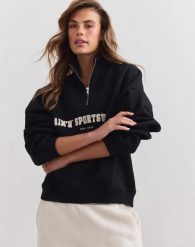 Damska bluza dresowa z półzamkiem, drapana, luźna Varsity czarny. Czarne bluzy damskie Aim'n, xl, bez wzorów, z bawełny, bez kaptura, na fitness i siłownię. Za 344.00 zł.