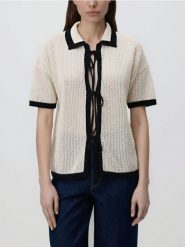 Sweter z wiązaniem - kremowy. Białe swetry damskie Reserved, l, bez wzorów, z bawełny, bez kołnierzyka, bez ramiączek, bez kaptura. Za 119.99 zł.
