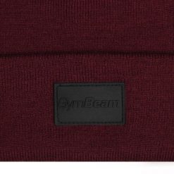 Czapka unisex z akrylowej dzianiny bordowa Polar. Czerwone czapki i kapelusze męskie GYMBEAM, na zimę, bez wzorów, z dzianiny, sportowe. Za 42.90 zł.