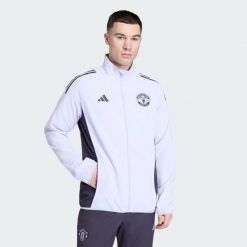 Kurtka reprezentacyjna Manchester United Tiro 25 Competition. Czarne kurtki męskie Adidas, bez wzorów, do piłki nożnej. Za 369.00 zł.
