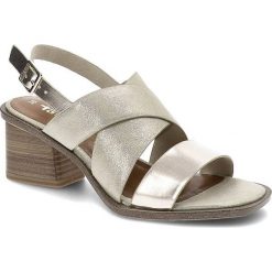 Złote Sandały Tamaris Skórzane Eleganckie Buty. Żółte klapki damskie Tamaris, bez wzorów, z nubiku, bez obcasa, na obcasie, bez zapięcia. Za 239.00 zł.