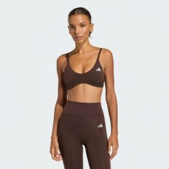 Biustonosz Optime Essentials Workout Light Support. Brązowe obuwie sportowe damskie Adidas, bez wzorów, na fitness i siłownię. Za 179.00 zł.