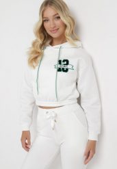 Biała Bluza o Krótkim Fasonie z Kapturem i Ściągaczami oraz Nadrukiem Varel. Białe bluzy damskie Born2be, l, bez wzorów, z kapturem. Za 34.99 zł.