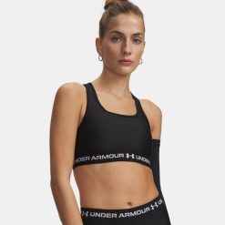 Biustonosz treningowy Under Armour Crossback Mid ultimate black/white. Czarne obuwie sportowe damskie Under Armour, bez wzorów, na fitness i siłownię. Za 99.99 zł.