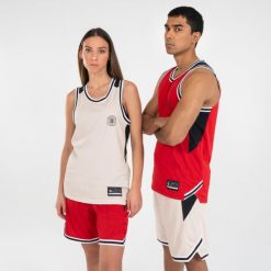Dwustronna koszulka do koszykówki Tarmak T500. Czerwone koszulki sportowe męskie TARMAK, l, bez wzorów, z materiału, bez kołnierzyka, bez ramiączek, do koszykówki. W wyprzedaży za 69.99 zł.