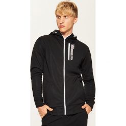 Bluza z napisami - Czarny. Bluzy męskie marki House. W wyprzedaży za 79.99 zł.