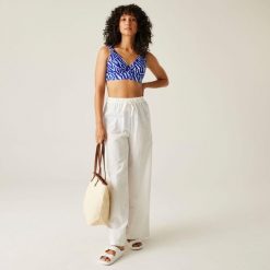 Góra od stroju kąpielowego damska Paloma. Niebieskie bikini damskie Regatta, bez wzorów. W wyprzedaży za 93.80 zł.