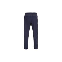 Spodnie fitness kardio męskie FPA 500 granatowe. Niebieskie spodnie sportowe męskie DOMYOS, l, bez wzorów, z elastanu, na fitness i siłownię. Za 79.99 zł.