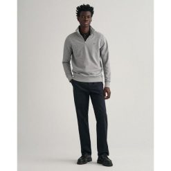 Bluza z pół zamkiem błyskawicznym Gant Reg Shield. Szare bluzy męskie GANT, m, bez wzorów, z bawełny, bez kaptura. Za 449.75 zł.