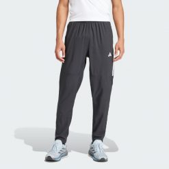 Spodnie Own the Run 3-Stripes. Czarne spodnie sportowe męskie Adidas, l, bez wzorów, z materiału, do biegania. Za 319.00 zł.