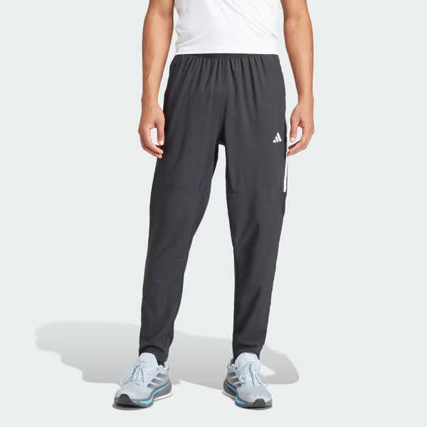Spodnie Own the Run 3-Stripes. Czarne spodnie sportowe męskie Adidas, l, bez wzorów, z materiału, do biegania. Za 319.00 zł.