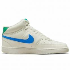 Obuwie Sportowe Damskie Nike 105. Białe obuwie sportowe damskie Nike, bez wzorów, z materiału, do koszykówki. Za 221.52 zł.